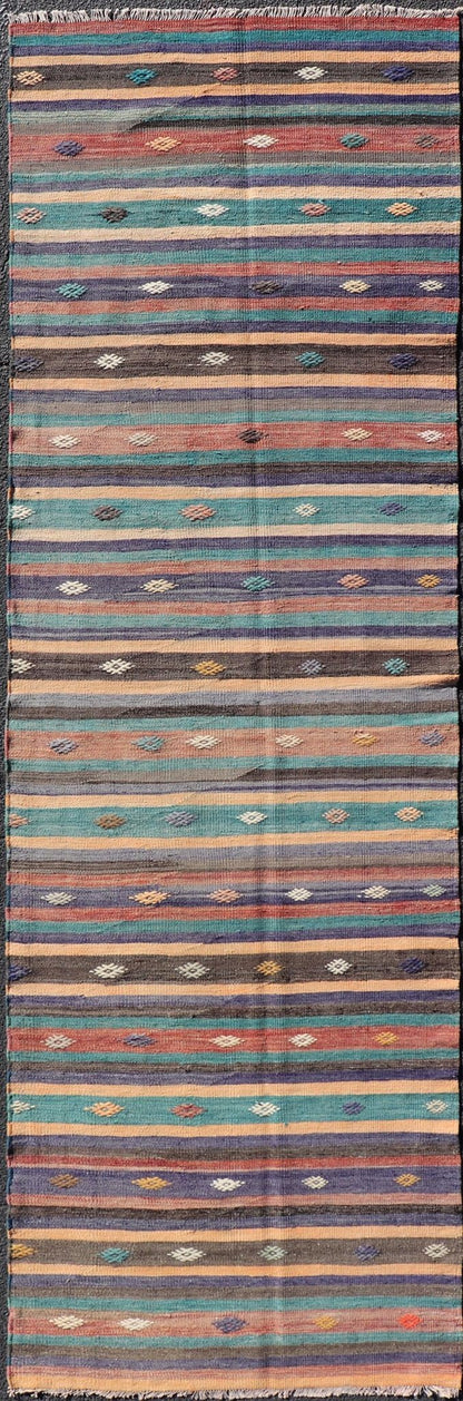 Measures: 3'3 x 10'10 Colorful Vintage Embroidered Kilim Runner with Stripe's and Geometric. Keivan Woven Arts / rug TU - NED - 5003, country of origin / type: Turkey / Kilim, circa 1950 This vintage Kilim displays an array of designs, including... - Keivan Woven ArtsTU - NED - 5003 - 22183Rug