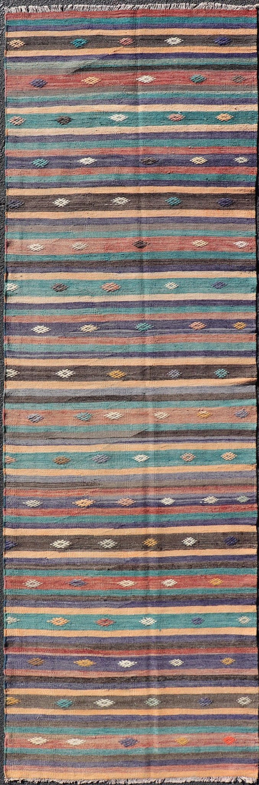 Measures: 3'3 x 10'10 Colorful Vintage Embroidered Kilim Runner with Stripe's and Geometric. Keivan Woven Arts / rug TU - NED - 5003, country of origin / type: Turkey / Kilim, circa 1950 This vintage Kilim displays an array of designs, including... - Keivan Woven ArtsTU - NED - 5003 - 22183