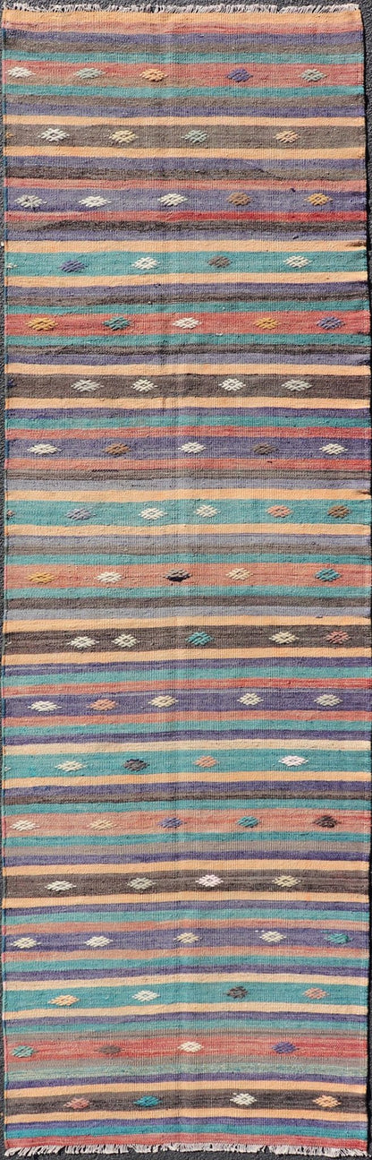 Measures: 3'3 x 10'10 Colorful Vintage Embroidered Kilim Runner with Stripe's and Geometric. Keivan Woven Arts / rug TU - NED - 5004, country of origin / type: Turkey / Kilim, circa 1950 This vintage Kilim displays an array of designs, including... - Keivan Woven ArtsTU - NED - 5004 - 22189Rug