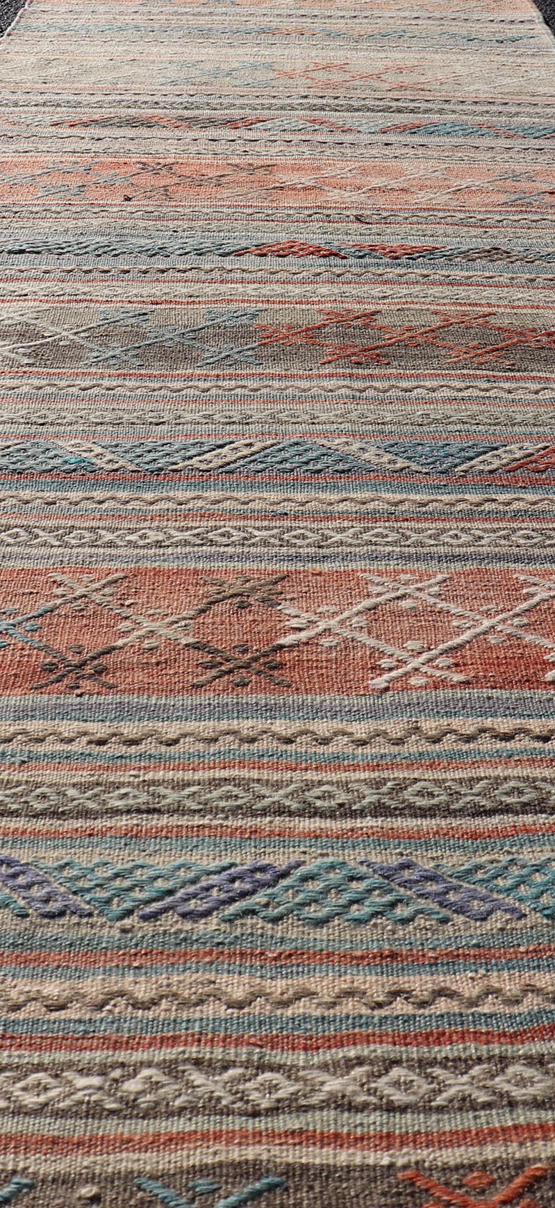 Measures: 2'7 x 9'7 Vintage Turkish Colorful Kilim Runner with Stripe Design in Tan and Orange's. Keivan Woven Arts / rug TU - NED - 5005, country of origin / type: Turkey / Kilim, circa 1950. Featuring a striking stripe design, this unique 1950s Ki... - Keivan Woven ArtsTU - NED - 5005 - 22195Rug