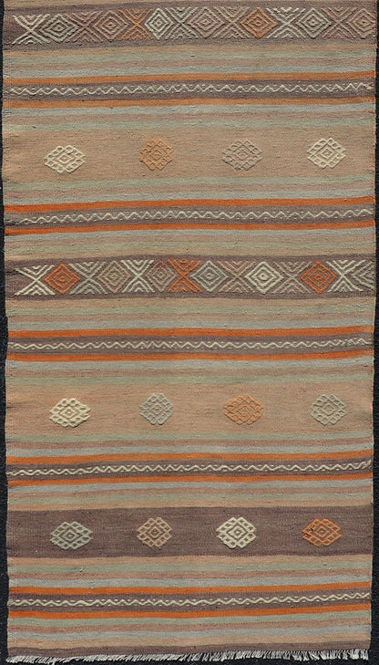 Measures: 3'4 x 11'3 Turkish Vintage Flat - Weave Kilim in Muted Colors with Stripes and Embroideries. Keivan Woven Arts: rug TU - NED - 5011 / mid 20th century Turkey. This charming vintage flat weave Kilim was hand woven in Turkey during the 195... - Keivan Woven ArtsTU - NED - 5011 - 23006Rug