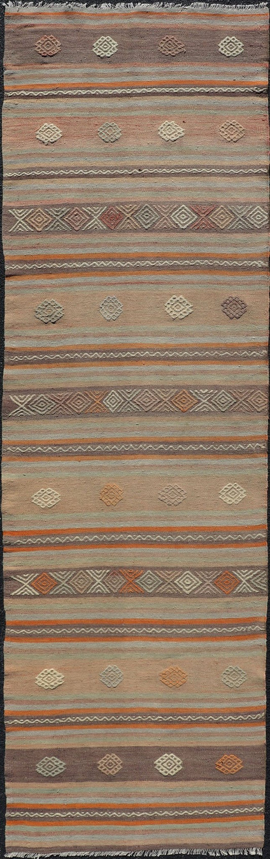 Measures: 3'4 x 11'3 Turkish Vintage Flat - Weave Kilim in Muted Colors with Stripes and Embroideries. Keivan Woven Arts: rug TU - NED - 5011 / mid 20th century Turkey. This charming vintage flat weave Kilim was hand woven in Turkey during the 195... - Keivan Woven ArtsTU - NED - 5011 - 23006Rug