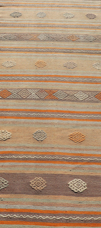Measures: 3'4 x 11'3 Turkish Vintage Flat - Weave Kilim in Muted Colors with Stripes and Embroideries. Keivan Woven Arts: rug TU - NED - 5011 / mid 20th century Turkey. This charming vintage flat weave Kilim was hand woven in Turkey during the 195... - Keivan Woven ArtsTU - NED - 5011 - 23006Rug