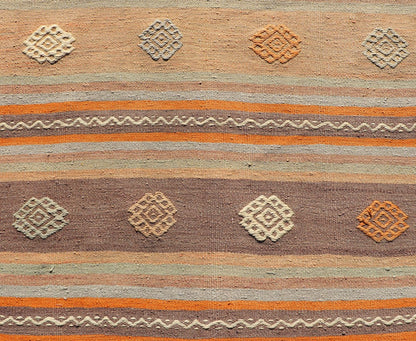 Measures: 3'4 x 11'3 Turkish Vintage Flat - Weave Kilim in Muted Colors with Stripes and Embroideries. Keivan Woven Arts: rug TU - NED - 5011 / mid 20th century Turkey. This charming vintage flat weave Kilim was hand woven in Turkey during the 195... - Keivan Woven ArtsTU - NED - 5011 - 23006Rug