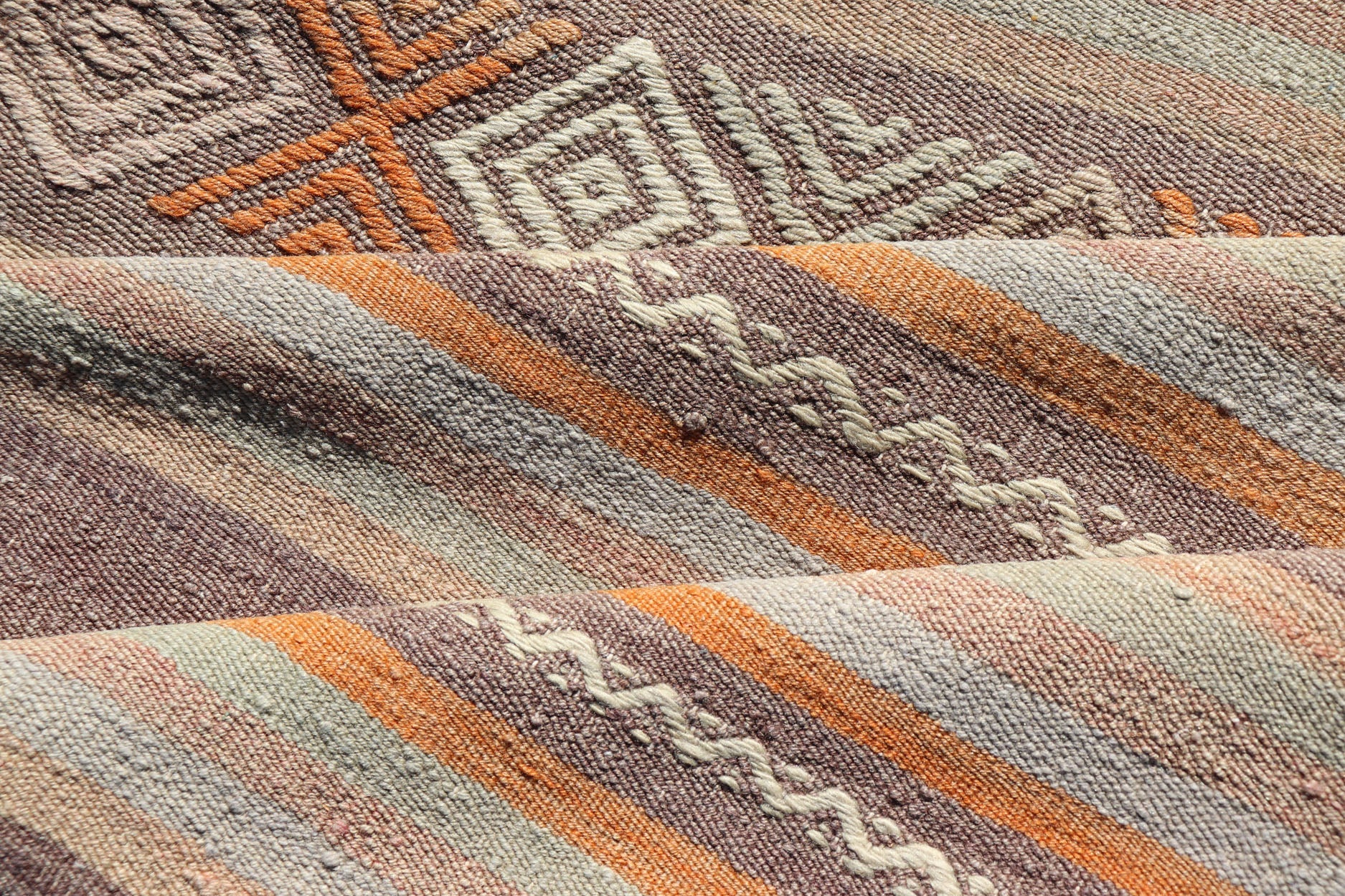 Measures: 3'4 x 11'0 Vintage Turkish Flat - Weave Kilim in Muted Colors with Stripes and Embroideries. Keivan Woven Arts: rug TU - NED - 5012 / mid 20th century Turkey. This charming vintage flat weave Kilim was hand woven in Turkey during the 19... - Keivan Woven ArtsTU - NED - 5012 - 23012Rug