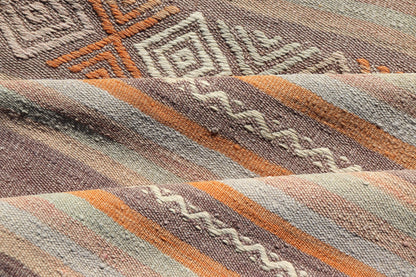 Measures: 3'4 x 11'0 Vintage Turkish Flat - Weave Kilim in Muted Colors with Stripes and Embroideries. Keivan Woven Arts: rug TU - NED - 5012 / mid 20th century Turkey. This charming vintage flat weave Kilim was hand woven in Turkey during the 19... - Keivan Woven ArtsTU - NED - 5012 - 23012Rug