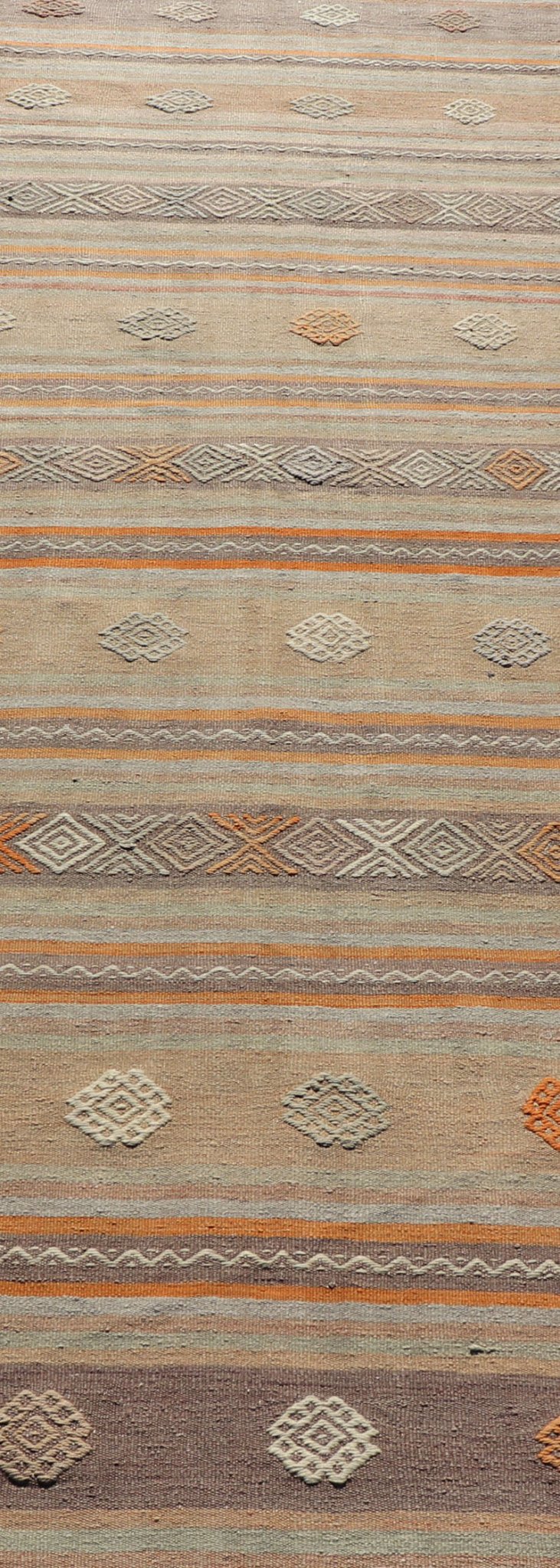 Measures: 3'4 x 11'0 Vintage Turkish Flat - Weave Kilim in Muted Colors with Stripes and Embroideries. Keivan Woven Arts: rug TU - NED - 5012 / mid 20th century Turkey. This charming vintage flat weave Kilim was hand woven in Turkey during the 19... - Keivan Woven ArtsTU - NED - 5012 - 23012Rug
