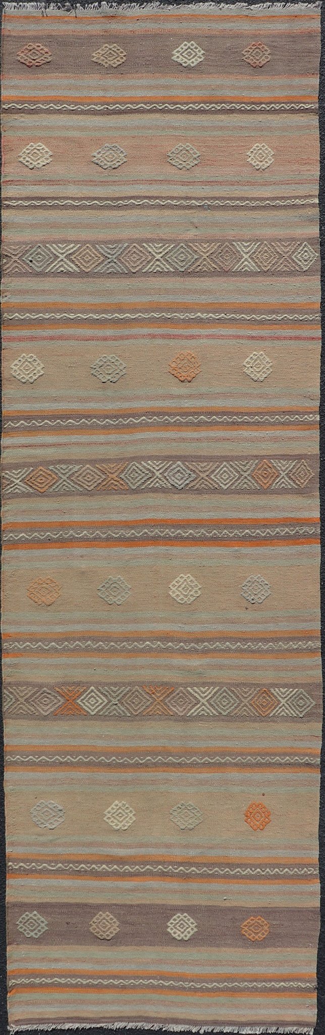 Measures: 3'4 x 11'0 Vintage Turkish Flat - Weave Kilim in Muted Colors with Stripes and Embroideries. Keivan Woven Arts: rug TU - NED - 5012 / mid 20th century Turkey. This charming vintage flat weave Kilim was hand woven in Turkey during the 19... - Keivan Woven ArtsTU - NED - 5012 - 23012Rug