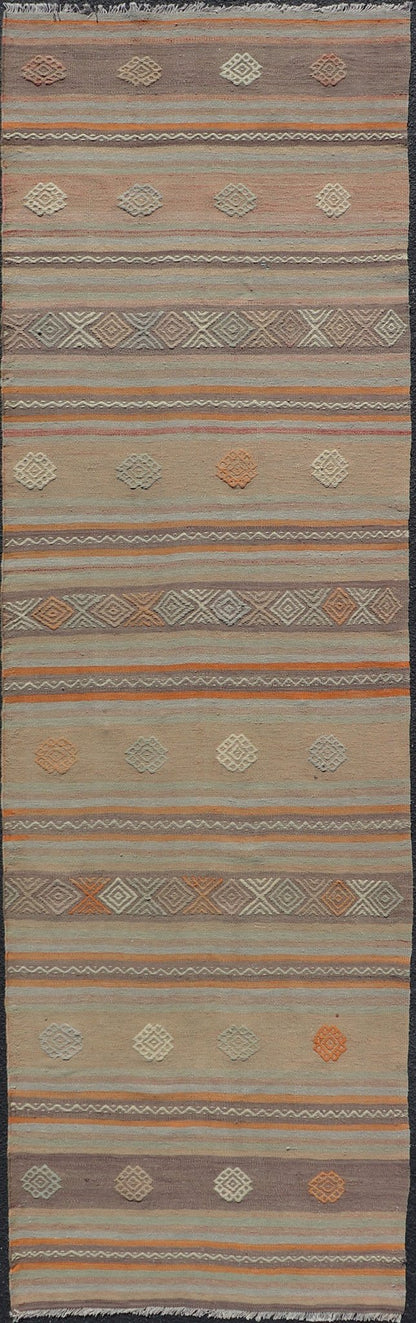 Measures: 3'4 x 11'0 Vintage Turkish Flat - Weave Kilim in Muted Colors with Stripes and Embroideries. Keivan Woven Arts: rug TU - NED - 5012 / mid 20th century Turkey. This charming vintage flat weave Kilim was hand woven in Turkey during the 19... - Keivan Woven ArtsTU - NED - 5012 - 23012Rug