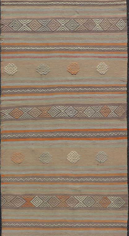 Measures: 3'4 x 11'0 Vintage Turkish Flat - Weave Kilim in Muted Colors with Stripes and Embroideries. Keivan Woven Arts: rug TU - NED - 5012 / mid 20th century Turkey. This charming vintage flat weave Kilim was hand woven in Turkey during the 19... - Keivan Woven ArtsTU - NED - 5012 - 23012Rug
