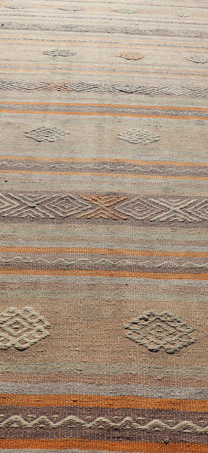 Measures: 3'4 x 11'0 Vintage Turkish Flat - Weave Kilim in Muted Colors with Stripes and Embroideries. Keivan Woven Arts: rug TU - NED - 5012 / mid 20th century Turkey. This charming vintage flat weave Kilim was hand woven in Turkey during the 19... - Keivan Woven ArtsTU - NED - 5012 - 23012Rug