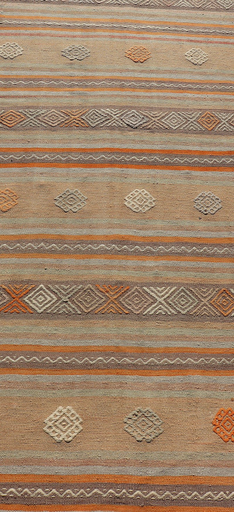 Measures: 3'4 x 11'0 Vintage Turkish Flat - Weave Kilim in Muted Colors with Stripes and Embroideries. Keivan Woven Arts: rug TU - NED - 5012 / mid 20th century Turkey. This charming vintage flat weave Kilim was hand woven in Turkey during the 19... - Keivan Woven ArtsTU - NED - 5012 - 23012Rug