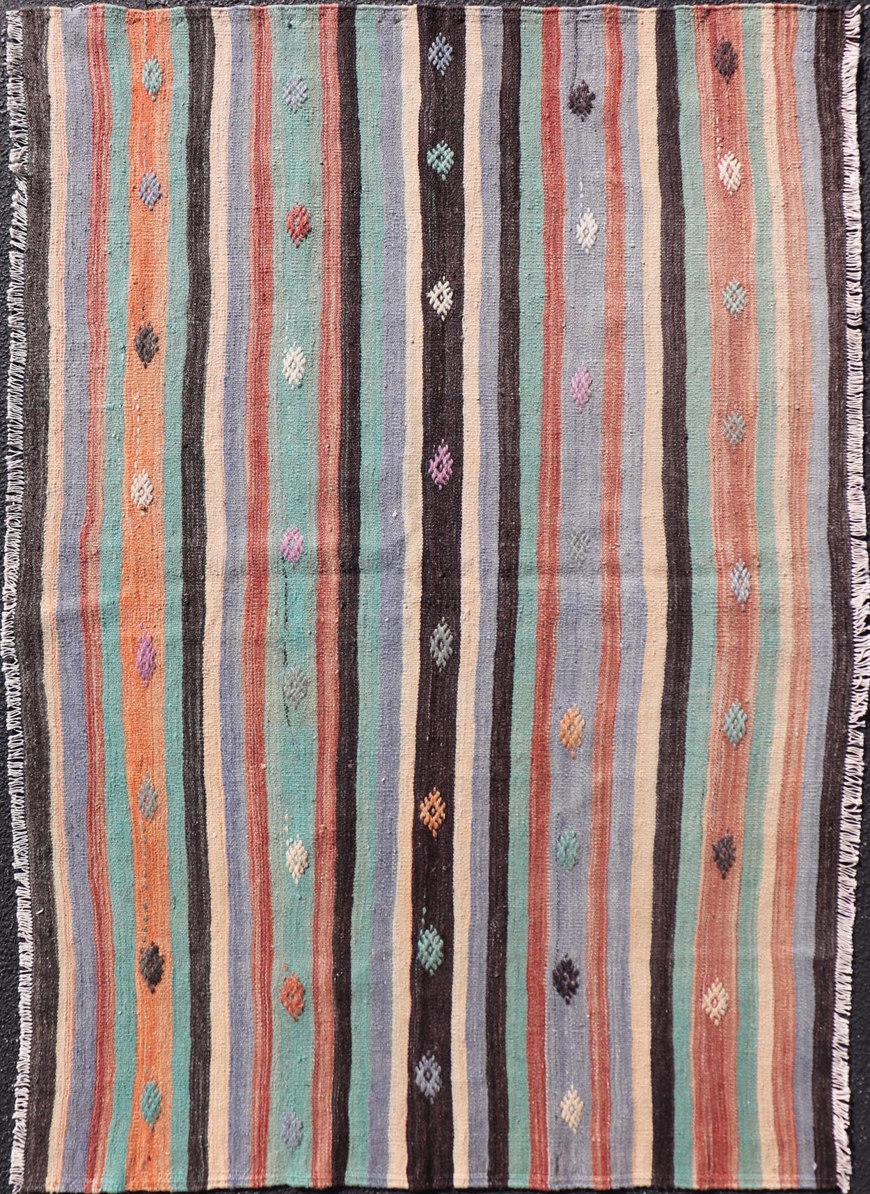 Measures: 3'7 x 5'7 Vintage Turkish Kilim in Multi Colors and Geometric Tribal Motifs. Keivan Woven Arts/ rug/ TU - NED - 5014, country of origin / type: Turkey / Kilim, circa mid - 20th century Featuring a repeating stripe design, this unique midc... - Keivan Woven ArtsTU - NED - 5014 - 22231Rug
