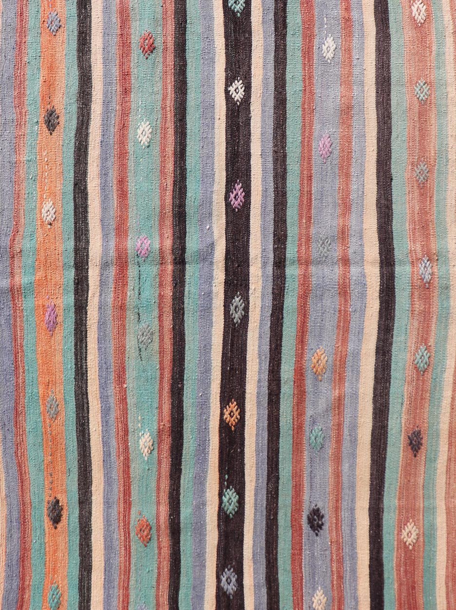 Measures: 3'7 x 5'7 Vintage Turkish Kilim in Multi Colors and Geometric Tribal Motifs. Keivan Woven Arts/ rug/ TU - NED - 5014, country of origin / type: Turkey / Kilim, circa mid - 20th century Featuring a repeating stripe design, this unique midc... - Keivan Woven ArtsTU - NED - 5014 - 22231Rug