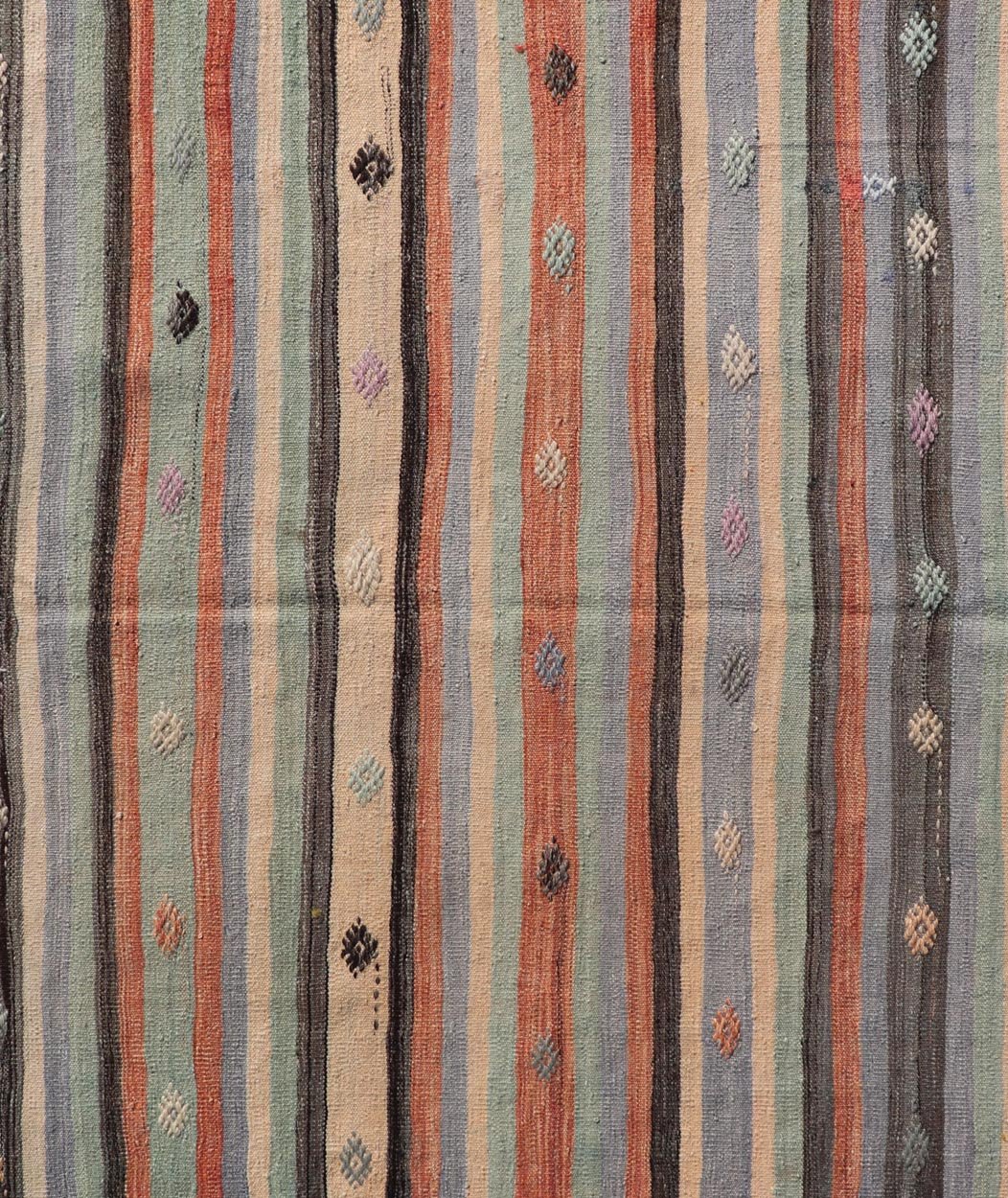 Measures: 3'8 x 5'8 Vintage Stripe Turkish Kilim in Multi Colors and Geometric Tribal Motifs. Keivan Woven Arts/ rug/ TU - NED - 5015, country of origin / type: Turkey / Kilim, circa mid - 20th century Featuring a repeating stripe design, this unique ... - Keivan Woven ArtsTU - NED - 5015 - 22237Rug