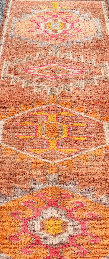 Measures: 2'9 x 11'0 Vintage Turkish Runner with Large Medallion Kurdish Design in Earthy Tones. Keivan Woven Arts / rug TU - NED - 5021, country of origin / type: Turkey / Oushak, circa 1960. This beautiful vintage Oushak runner from 1960s Turkey f... - Keivan Woven ArtsTU - NED - 5021 - 22267Rug