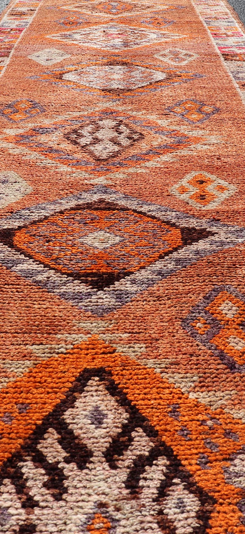 Measures: 3'0 x 14'2 Multicolored Midcentury Turkish Kurdish Oushak Runner with Diamond Medallions. Keivan Woven Arts / rug TU - NED - 5022, country of origin / type: Iran / Kurdish Oushak, circa 1950 This Kurdish tribal rug was woven with the empha... - Keivan Woven ArtsTU - NED - 5022 - 22273Rug