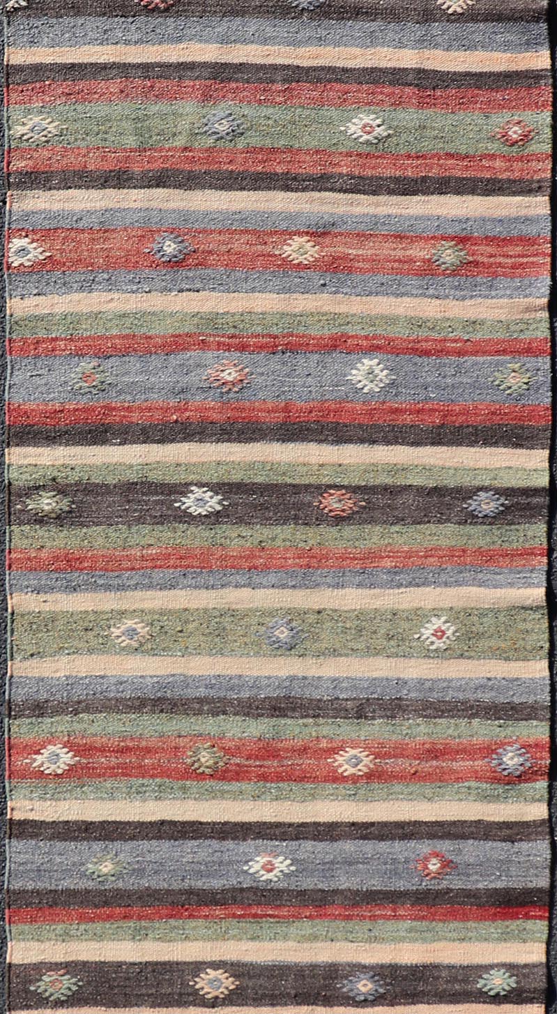 Turkish Vintage Kilim Striped Runner with Tribal Motifs in Copper and Greens Measures: 2'8 x 10'7 Turkish Vintage Kilim Striped Runner with Tribal Motifs in Copper and Greens. Keivan Woven Arts / rug TU - NED - 5023, country of origin / type: T... - Keivan Woven ArtsTU - NED - 5023 - 22279Rug