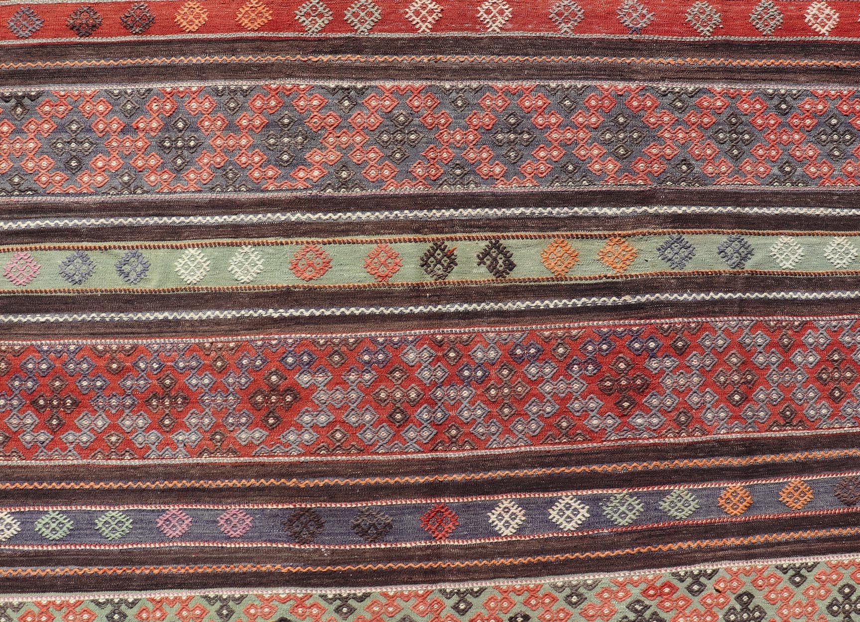 Measures: 6'0 x 10'8 Vintage Turkish Embroidered Large Gallery Kilim Rug with Stripe Design. Keivan Woven Arts / rug TU - NED - 5027, country of origin / type: Turkey / Kilim, circa Mid - 20th Century. Woven during the mid - 20th century in Turkey, this... - Keivan Woven ArtsTU - NED - 5027 - 22303Rug