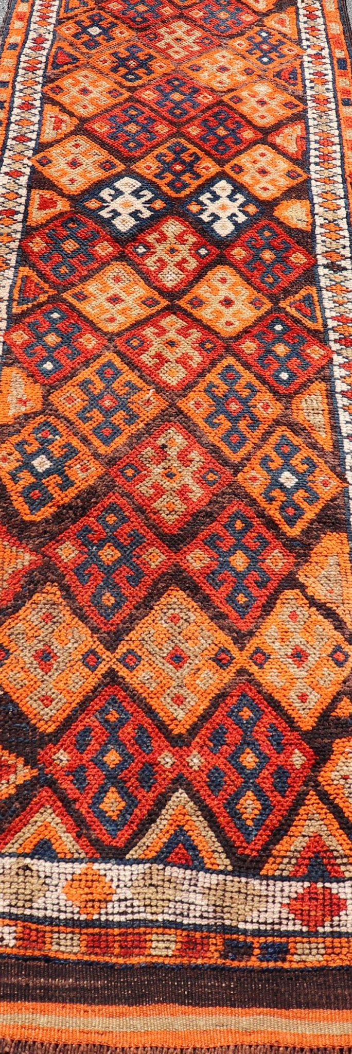 Measures: 3'0 x 11'5 Vintage Turkish Runner with All - Over Diamond Tribal Design in Multi - Colors. Keivan Woven Arts / TU - NED - 5029, country of origin / type: Turkey / Oushak, circa 1960. This beautiful vintage Oushak runner from 1960s features... - Keivan Woven ArtsTU - NED - 5029 - 22315Rug