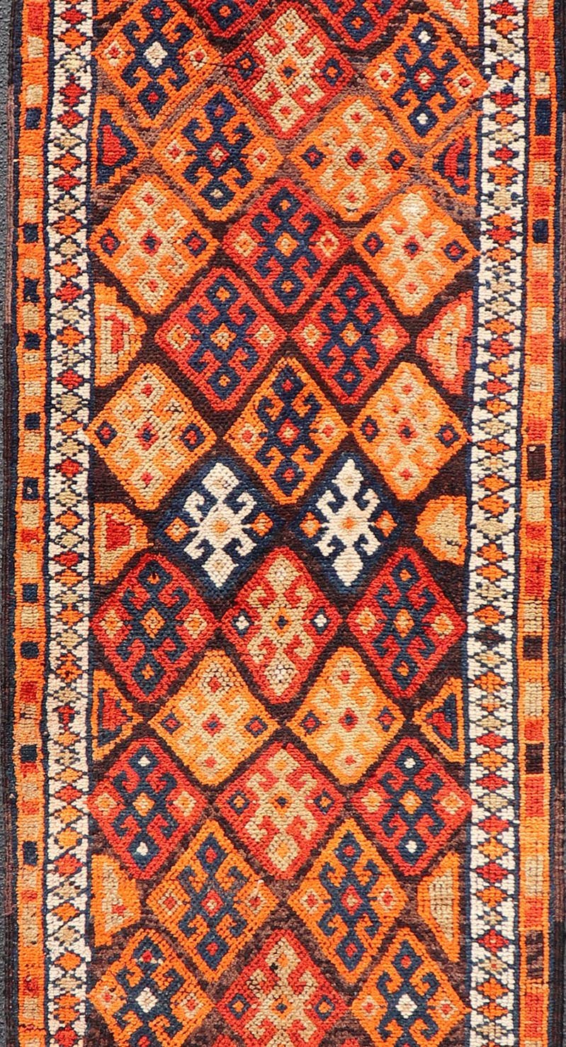 Measures: 3'0 x 11'5 Vintage Turkish Runner with All - Over Diamond Tribal Design in Multi - Colors. Keivan Woven Arts / TU - NED - 5029, country of origin / type: Turkey / Oushak, circa 1960. This beautiful vintage Oushak runner from 1960s features... - Keivan Woven ArtsTU - NED - 5029 - 22315Rug