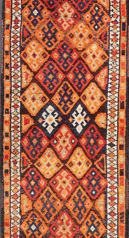 Measures: 3'0 x 11'5 Vintage Turkish Runner with All - Over Diamond Tribal Design in Multi - Colors. Keivan Woven Arts / TU - NED - 5029, country of origin / type: Turkey / Oushak, circa 1960. This beautiful vintage Oushak runner from 1960s features... - Keivan Woven ArtsTU - NED - 5029 - 22315Rug