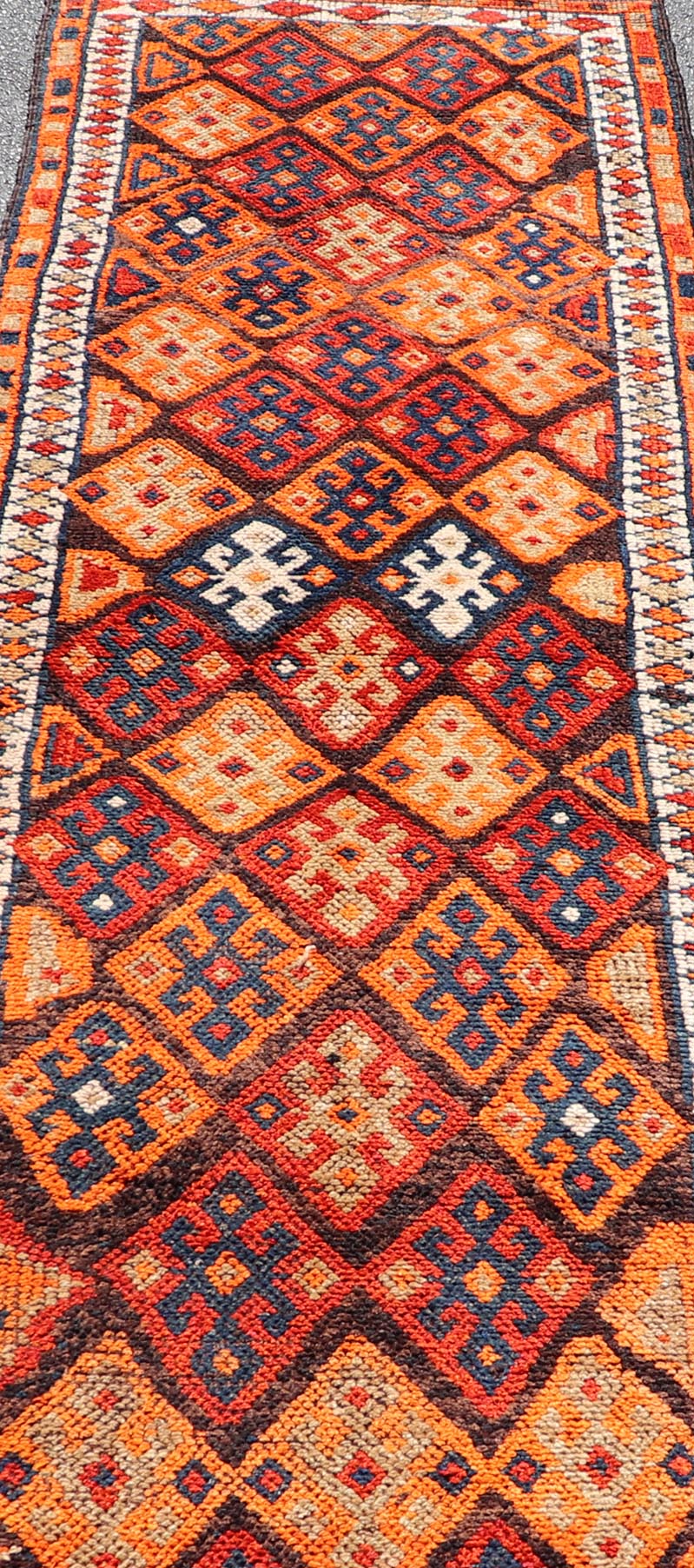 Measures: 3'0 x 11'5 Vintage Turkish Runner with All - Over Diamond Tribal Design in Multi - Colors. Keivan Woven Arts / TU - NED - 5029, country of origin / type: Turkey / Oushak, circa 1960. This beautiful vintage Oushak runner from 1960s features... - Keivan Woven ArtsTU - NED - 5029 - 22315Rug