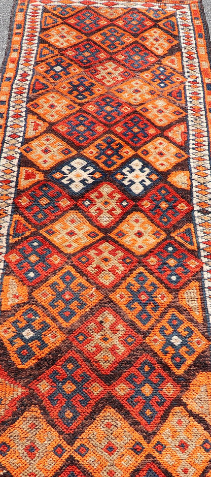 Measures: 3'0 x 11'5 Vintage Turkish Runner with All - Over Diamond Tribal Design in Multi - Colors. Keivan Woven Arts / TU - NED - 5029, country of origin / type: Turkey / Oushak, circa 1960. This beautiful vintage Oushak runner from 1960s features... - Keivan Woven ArtsTU - NED - 5029 - 22315Rug