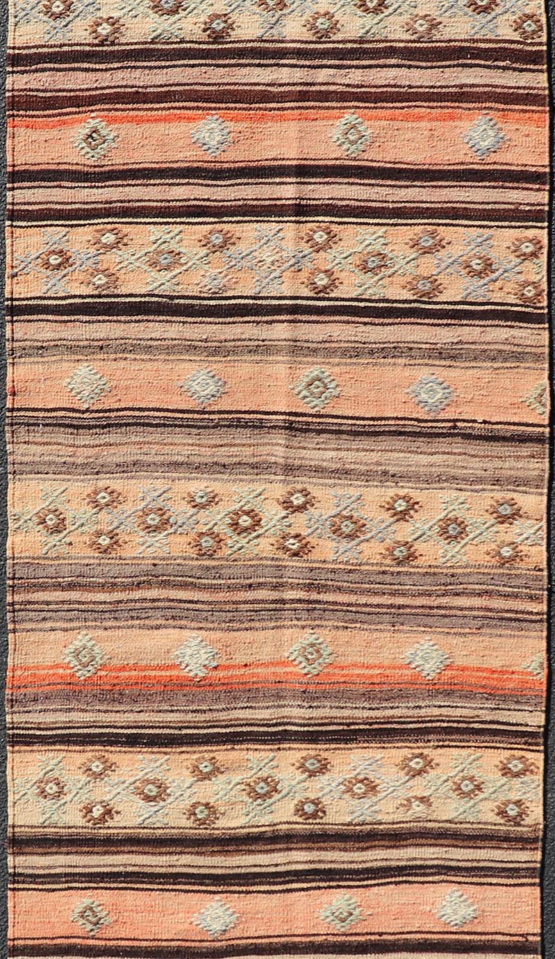 Measures: 3'1 x 11'7 Vintage Turkish Kilim Runner with Stripes in Tan, Brown, and Orange. Keivan Woven Arts / rug TU - NED - 5042, country of origin / type: Turkey / Kilim, circa Mid - 20th Century. This vintage flat - woven kilim runner features a mini... - Keivan Woven ArtsTU - NED - 5042 - 22345Rug