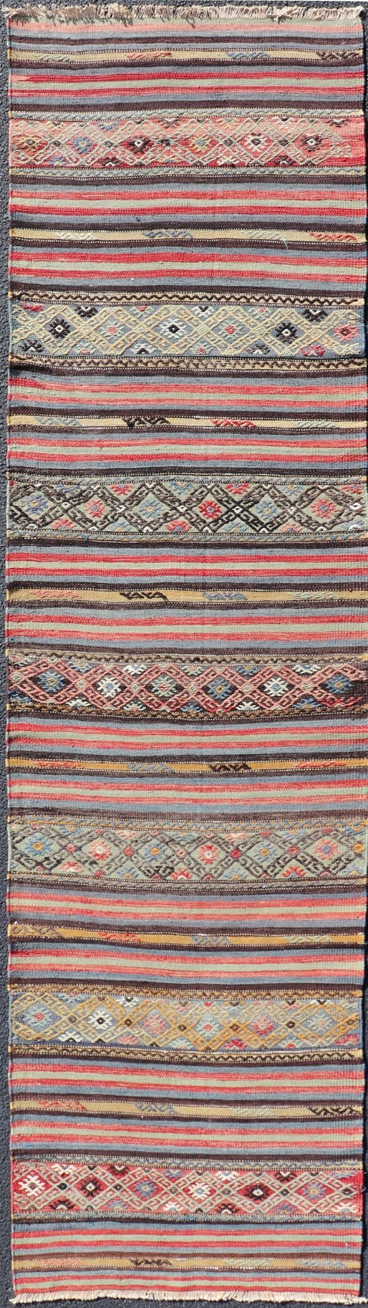 Turkish Vintage Kilim with Horizontal Stripes and Tribal Motifs Measures: 2'5 x 9'4 Turkish Vintage Kilim with Horizontal Stripes and Tribal Motifs. Keivan Woven Arts / rug TU - NED - 5046, country of origin / type: Turkey / Kilim, circa Mid - 20th C... - Keivan Woven ArtsTU - NED - 5046 - 22363Rug
