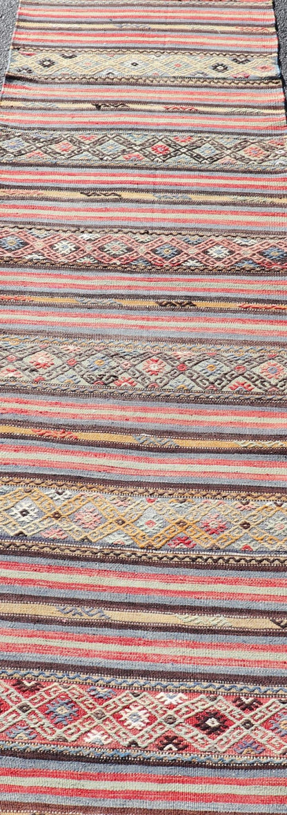 Turkish Vintage Kilim with Horizontal Stripes and Tribal Motifs Measures: 2'5 x 9'4 Turkish Vintage Kilim with Horizontal Stripes and Tribal Motifs. Keivan Woven Arts / rug TU - NED - 5046, country of origin / type: Turkey / Kilim, circa Mid - 20th C... - Keivan Woven ArtsTU - NED - 5046 - 22363Rug