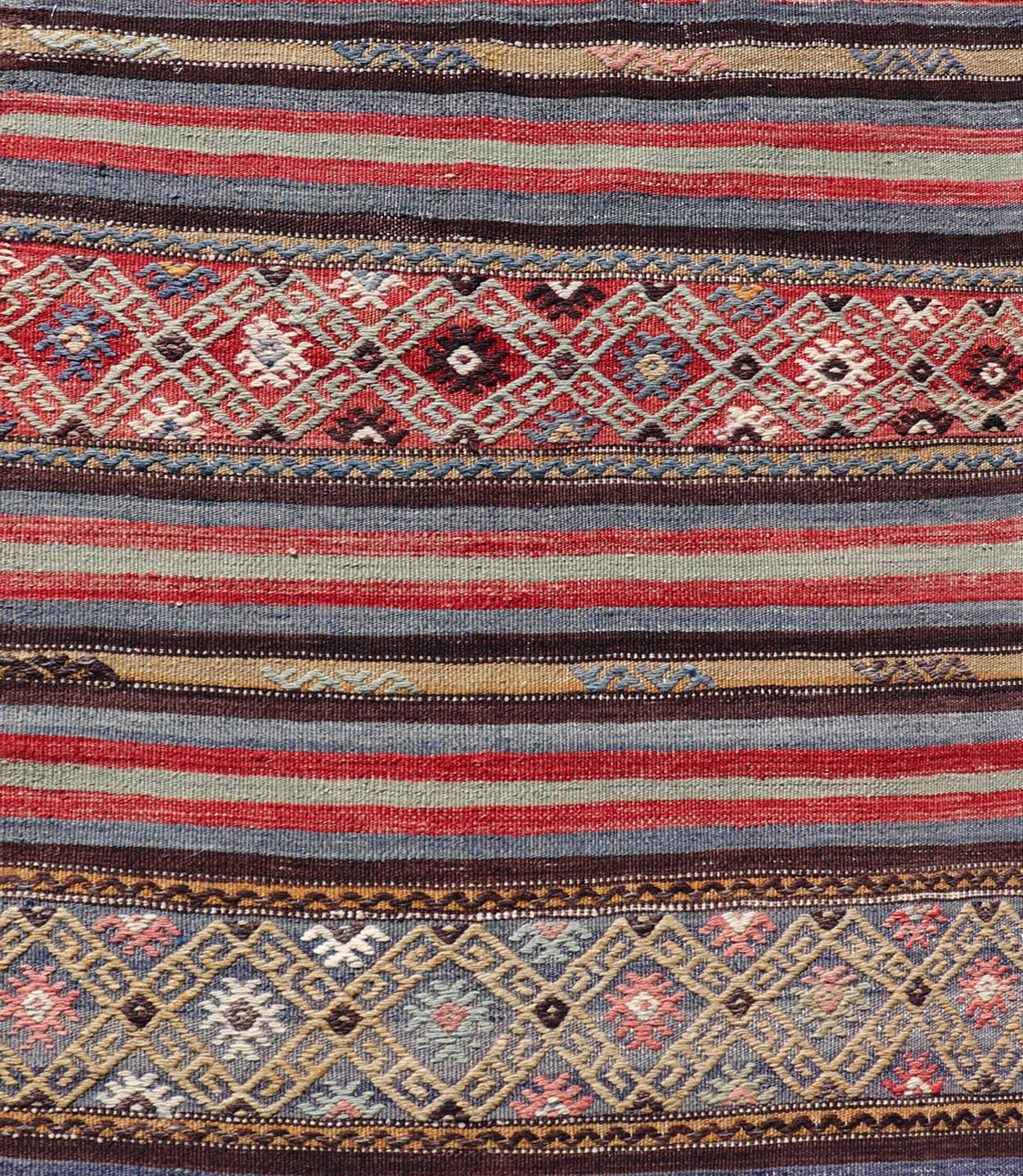 Vintage Turkish Kilim with Horizontal Stripes and Tribal Motifs in Bright Tones. Hand Woven vintage Turkish Kilim in colors with hand woven motifs with stripes, Keivan Woven Arts / rug TU - NED - 5047, country of origin / type: Turkey / Kilim, circ... - Keivan Woven ArtsTU - NED - 5047 - 22369Rug
