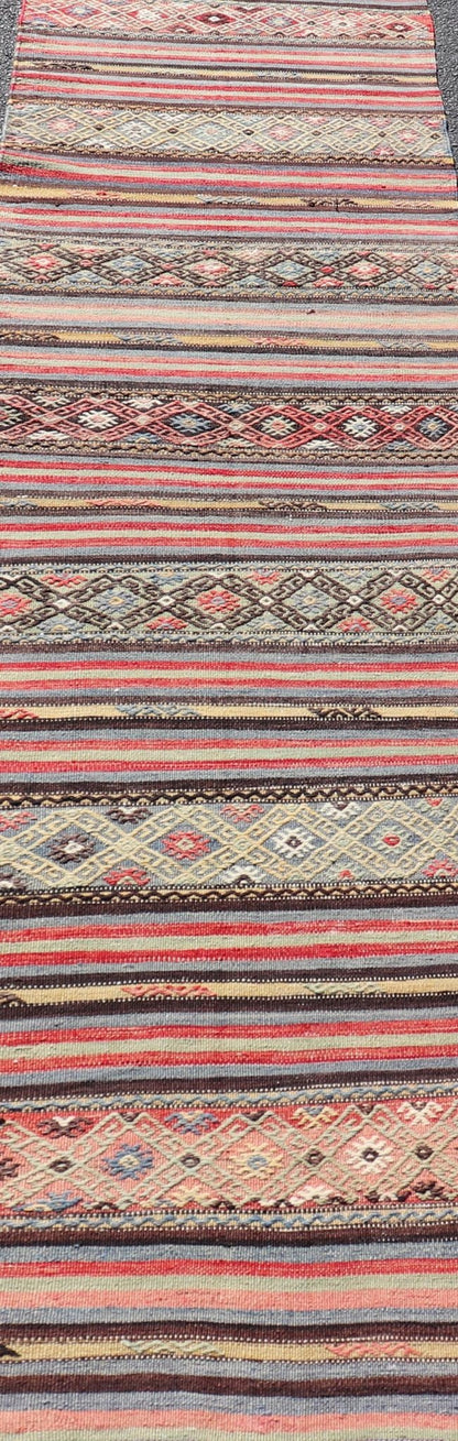 Vintage Turkish Kilim with Horizontal Stripes and Tribal Motifs in Bright Tones. Hand Woven vintage Turkish Kilim in colors with hand woven motifs with stripes, Keivan Woven Arts / rug TU - NED - 5047, country of origin / type: Turkey / Kilim, circ... - Keivan Woven ArtsTU - NED - 5047 - 22369Rug