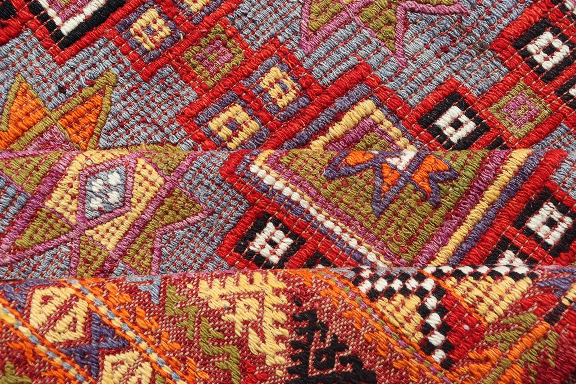 Measures: 6'5 x 9'0 This vintage Turkish Kilim rug is a striking representation of traditional Anatolian craftsmanship, featuring a complex array of geometric patterns that captivate and draw the eye. The rugs design is primarily composed of a sequ... - Keivan Woven ArtsTU - NED - 5084 - 27330Rug