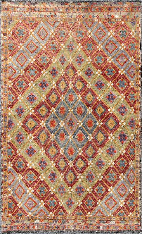 Colorful Kilim/Jijim with Diamonds - Featuring tribal shapes with a spotted and speckled assortment of geometric elements, this unique Mid - Century Jajeem showcases an array of rich colorful tones that have been softened by age. Colors include crimson red... - Keivan Woven ArtsTU - NED - 578 - 6911Rug