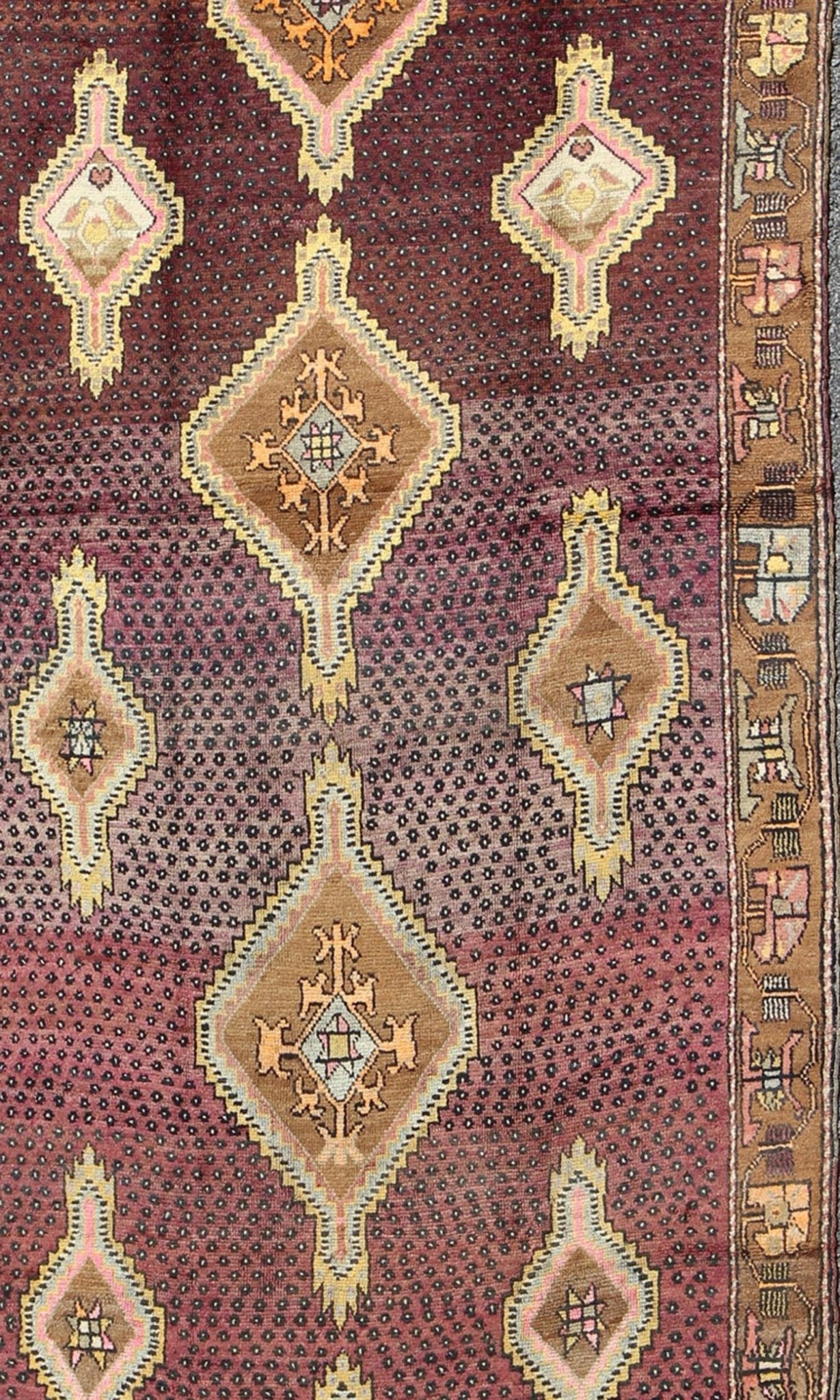 Vintage Turkish Medallion Oushak Kars Gallery Runner in Gold and Burgundy Measures: 5'7 x 12'8 This unique Turkish gallery runner rests beautifully upon a field of elegant purple and eggplant colors. The field medallions are decorated wi... - Keivan Woven ArtsTU - SIM - 136501 - 5026Rug