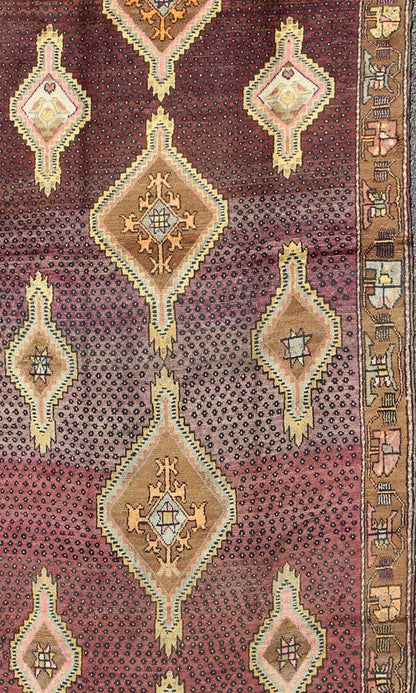 Vintage Turkish Medallion Oushak Kars Gallery Runner in Gold and Burgundy Measures: 5'7 x 12'8 This unique Turkish gallery runner rests beautifully upon a field of elegant purple and eggplant colors. The field medallions are decorated wi... - Keivan Woven ArtsTU - SIM - 136501 - 5026Rug