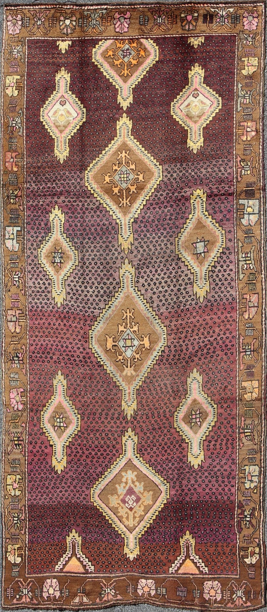 Vintage Turkish Medallion Oushak Kars Gallery Runner in Gold and Burgundy Measures: 5'7 x 12'8 This unique Turkish gallery runner rests beautifully upon a field of elegant purple and eggplant colors. The field medallions are decorated wi... - Keivan Woven ArtsTU - SIM - 136501 - 5026Rug