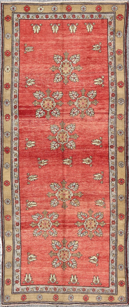 Vintage Turkish Oushak Carpet with Flowers in the Central Field and Borders Produced in mid - 20th century Turkey, this vintage Oushak is characterized by a comely and highly representative Oushak composition. Building on traditional designs, this... - Keivan Woven ArtsTU - SIM - 3641 - 6915Rug