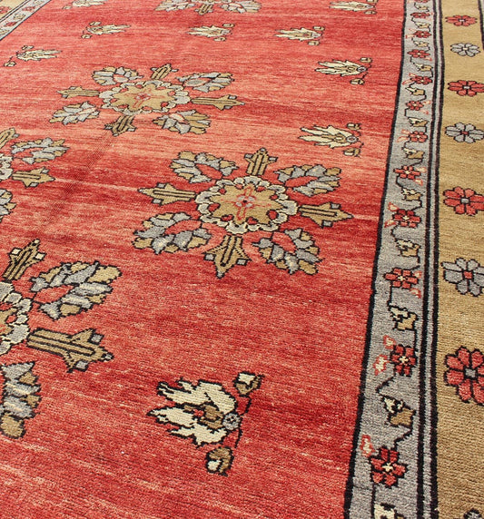 Vintage Turkish Oushak Carpet with Flowers in the Central Field and Borders Produced in mid - 20th century Turkey, this vintage Oushak is characterized by a comely and highly representative Oushak composition. Building on traditional designs, this... - Keivan Woven ArtsTU - SIM - 3641 - 6915