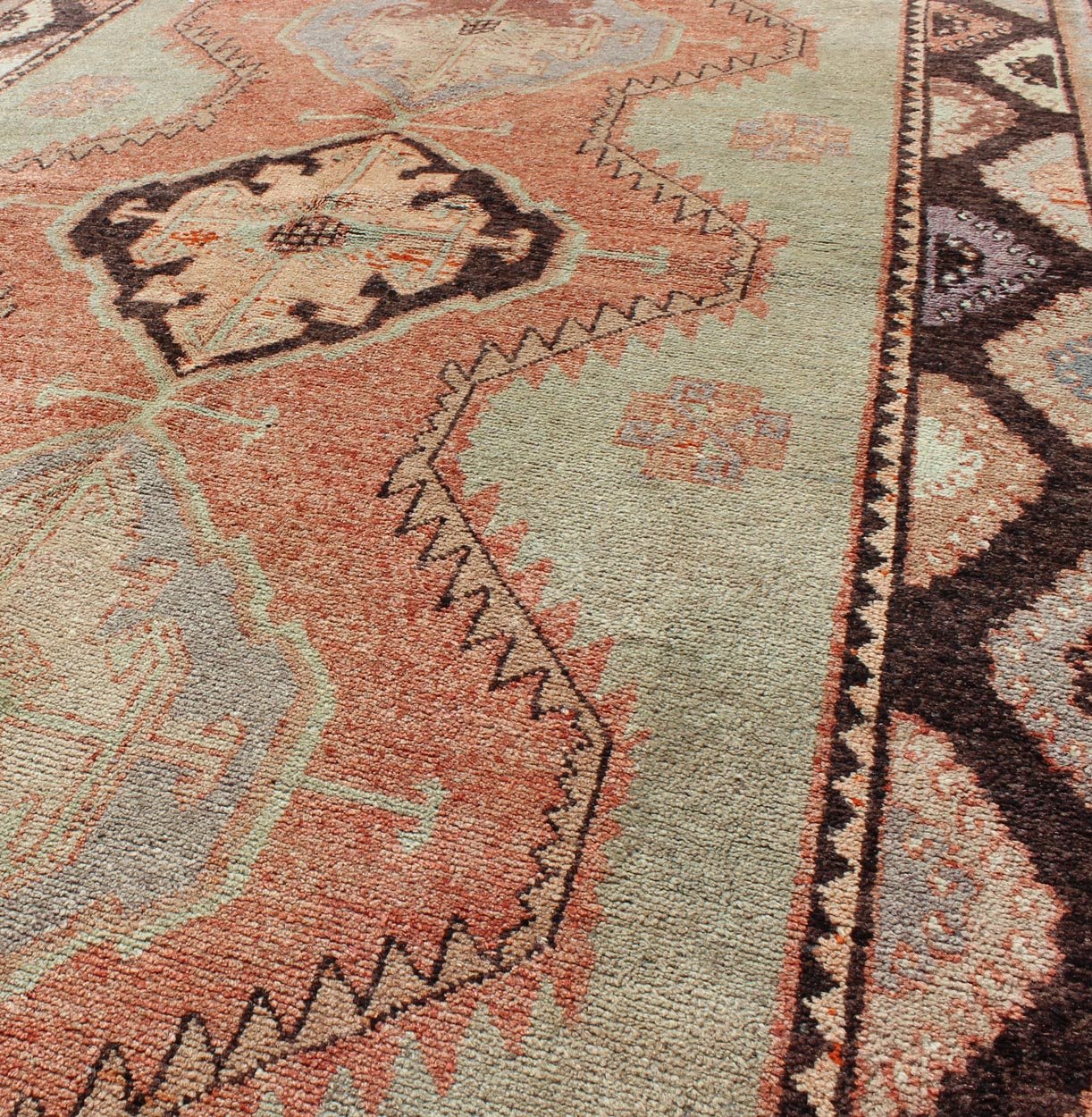 Turkish Oushak Rug This soft color Oushak carpet rests beautifully upon a field of elegant green and tangerine. Three medallions take center stage and are well balanced with a border of cast green, orange and natural brown. This Oushak remains e... - Keivan Woven ArtsTU - TOZ - 136540 - 5032Rug