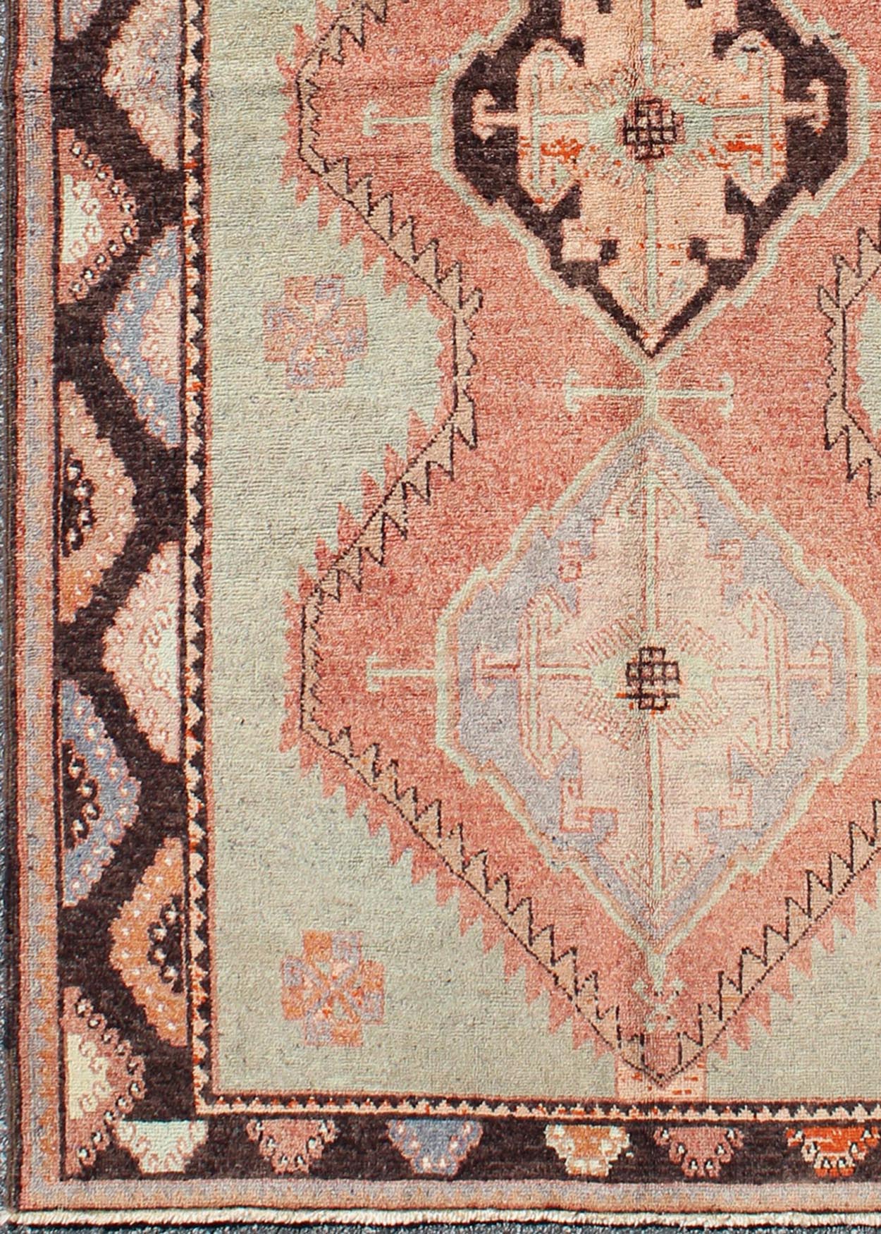 Turkish Oushak Rug This soft color Oushak carpet rests beautifully upon a field of elegant green and tangerine. Three medallions take center stage and are well balanced with a border of cast green, orange and natural brown. This Oushak remains e... - Keivan Woven ArtsTU - TOZ - 136540 - 5032Rug