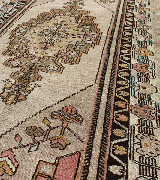 Vintage Turkey Oushak Rug with Tribal Geometric Medallion Design Measures: 3'9 x 7'7 This vintage Turkish Oushak carpet, (circa 1940) features a central medallion design, as well as patterns of smaller tribal - geometric elements in the fo... - Keivan Woven ArtsTU - TRS - 136080 - 4632Rug