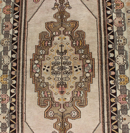 Vintage Turkey Oushak Rug with Tribal Geometric Medallion Design Measures: 3'9 x 7'7 This vintage Turkish Oushak carpet, (circa 1940) features a central medallion design, as well as patterns of smaller tribal - geometric elements in the fo... - Keivan Woven ArtsTU - TRS - 136080 - 4632Rug
