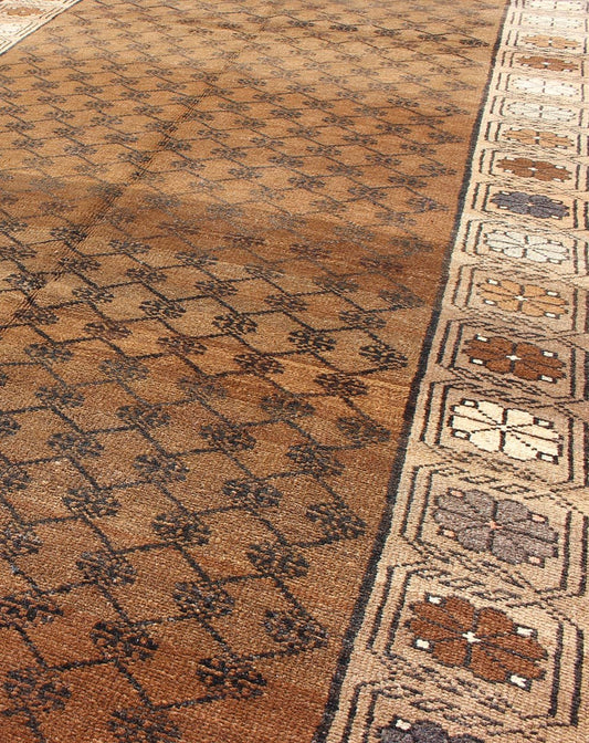 Vintage Turkish Kars Tribal Rug with All - Over Modern Design in Brown Colors kwarugs tu - trs - 136086 Set on a mocha and brown field with an all - over modern/Mid - Century Modern pattern, this beautiful Kars rug features cross - latch and lattice work. T... - Keivan Woven ArtsTU - TRS - 136086 - 5074Rug
