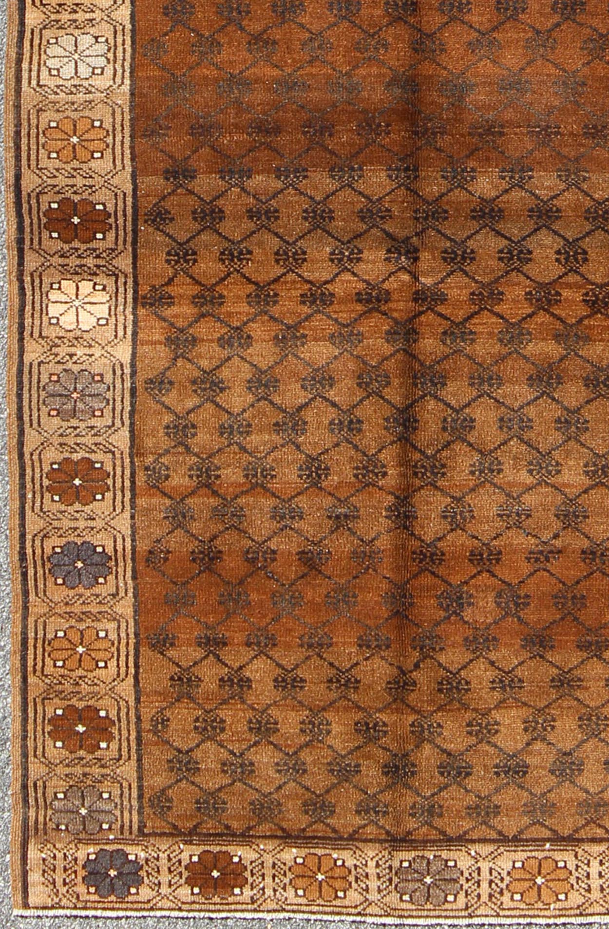 Vintage Turkish Kars Tribal Rug with All - Over Modern Design in Brown Colors kwarugs tu - trs - 136086 Set on a mocha and brown field with an all - over modern/Mid - Century Modern pattern, this beautiful Kars rug features cross - latch and lattice work. T... - Keivan Woven ArtsTU - TRS - 136086 - 5074Rug