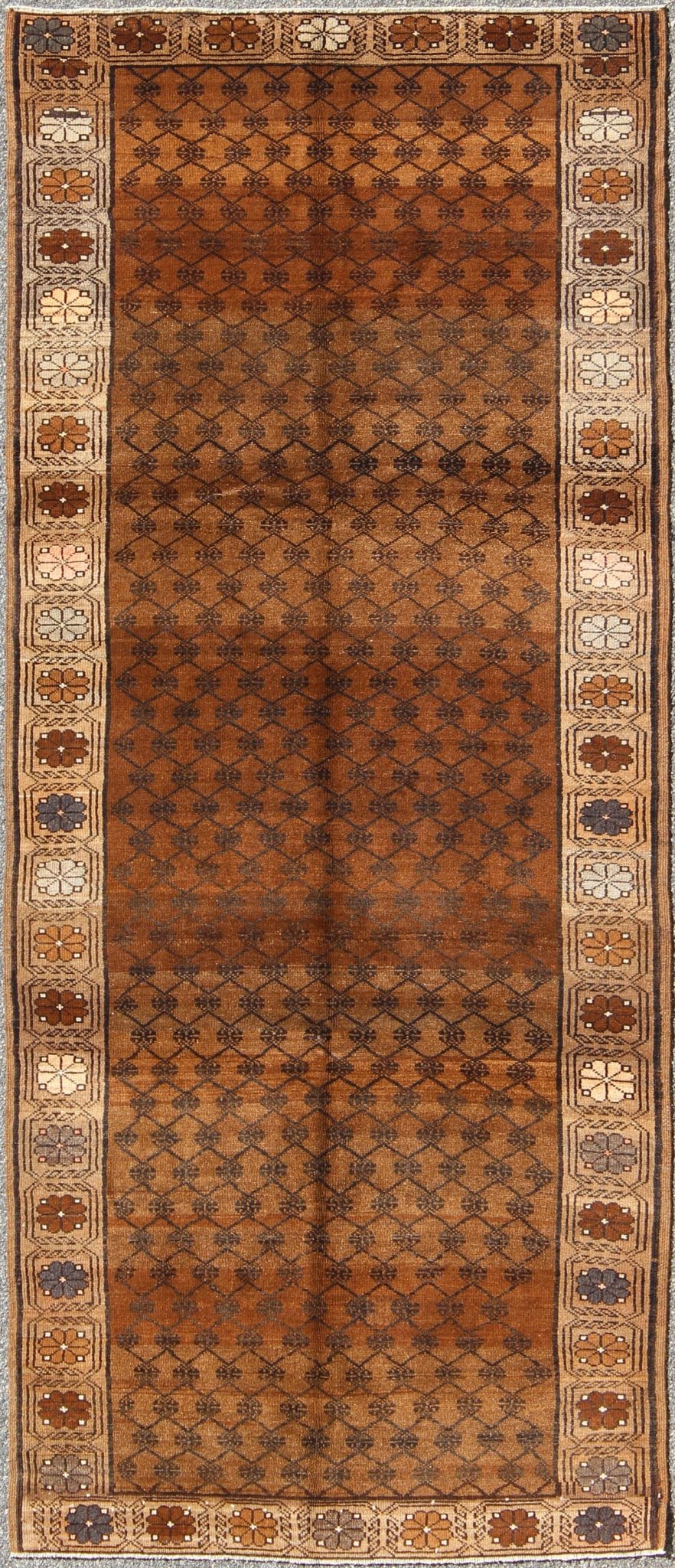 Vintage Turkish Kars Tribal Rug with All - Over Modern Design in Brown Colors kwarugs tu - trs - 136086 Set on a mocha and brown field with an all - over modern/Mid - Century Modern pattern, this beautiful Kars rug features cross - latch and lattice work. T... - Keivan Woven ArtsTU - TRS - 136086 - 5074Rug