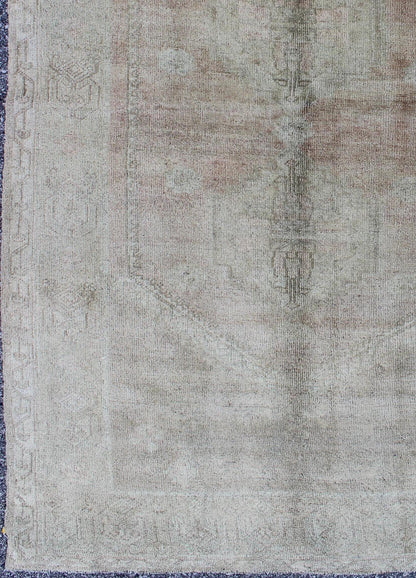 Faded Vintage Turkish Oushak rug with Central Medallion in gray and berry, rug tu - trs - 136508, country of origin / type: Turkey / Oushak, circa 1940 This sublime and enchanting vintage rug, a gorgeous Oushak rug made in Turkey during the mid - 20th... - Keivan Woven ArtsTU - TRS - 136508 - 5088Rug