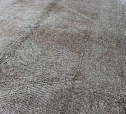 Faded Vintage Turkish Oushak rug with Central Medallion in gray and berry, rug tu - trs - 136508, country of origin / type: Turkey / Oushak, circa 1940 This sublime and enchanting vintage rug, a gorgeous Oushak rug made in Turkey during the mid - 20th... - Keivan Woven ArtsTU - TRS - 136508 - 5088Rug