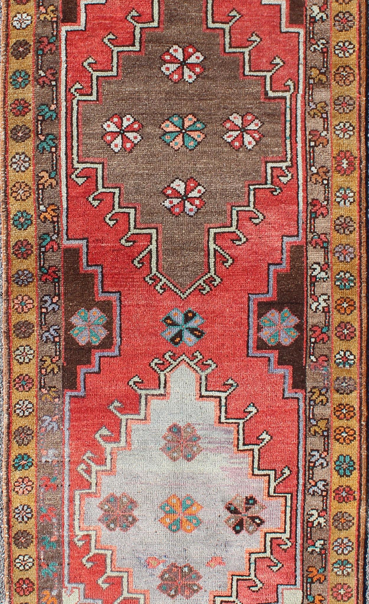 Vintage Turkish Oushak runner with Sub - geometric tribal medallions in brown, red, rug tu - TRS - 3251, country of origin / type: Turkey / Oushak, circa 1940 This vintage Oushak runner features a unique blend of cheerful colors and an intricately bea... - Keivan Woven ArtsTU - TRS - 3251 - 6408Rug